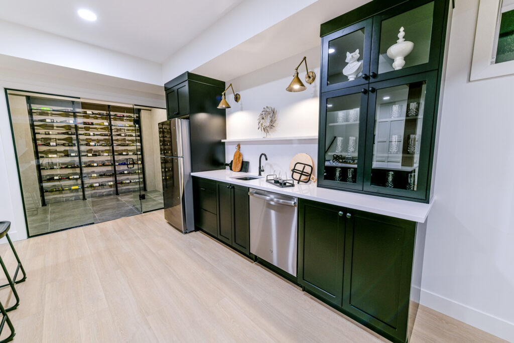 Monarch Homes, Kitchen, large wine collection, modern living in Grande Prairie, Alberta, Canada.